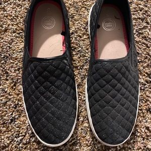 Black shimmer slip ons